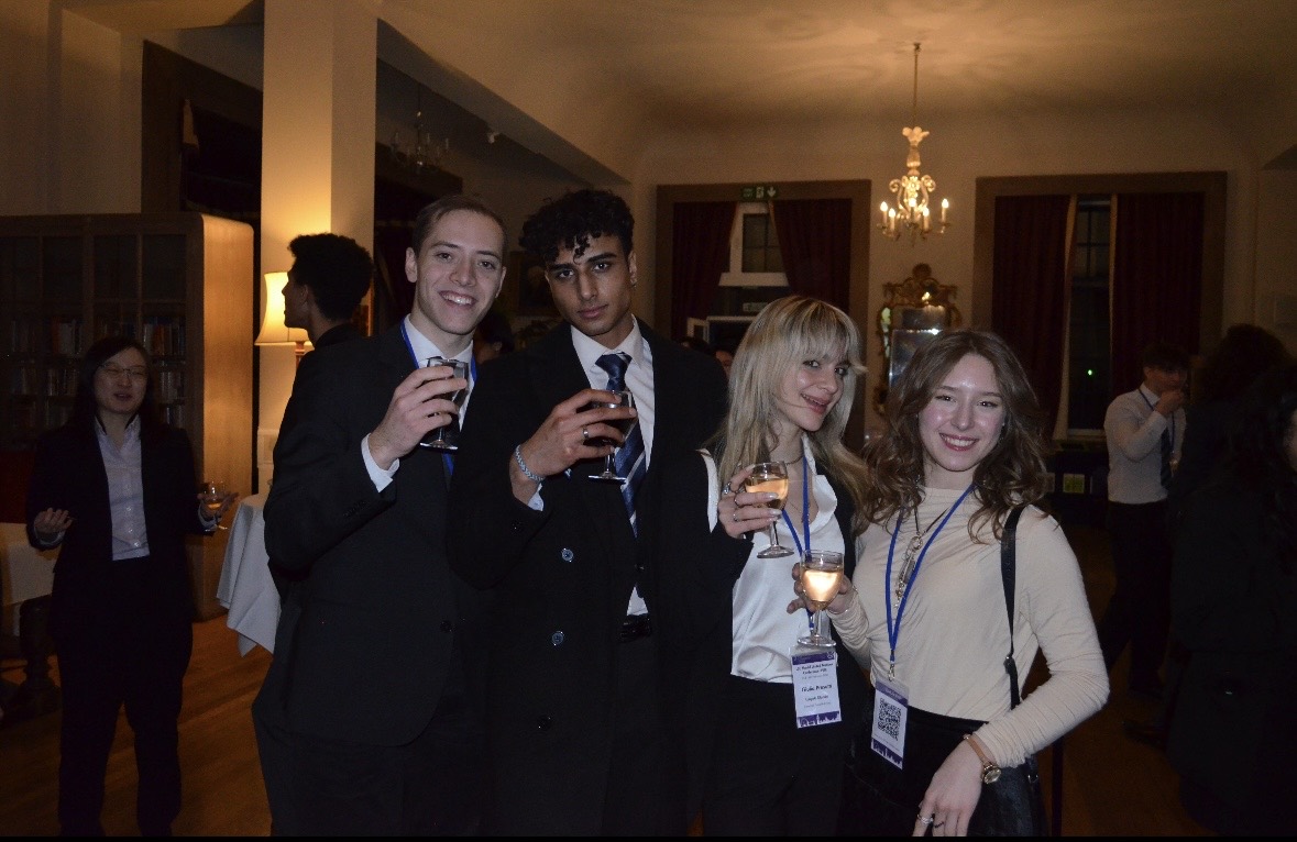 Jeeve with other Model United Nations participants at a formal reception